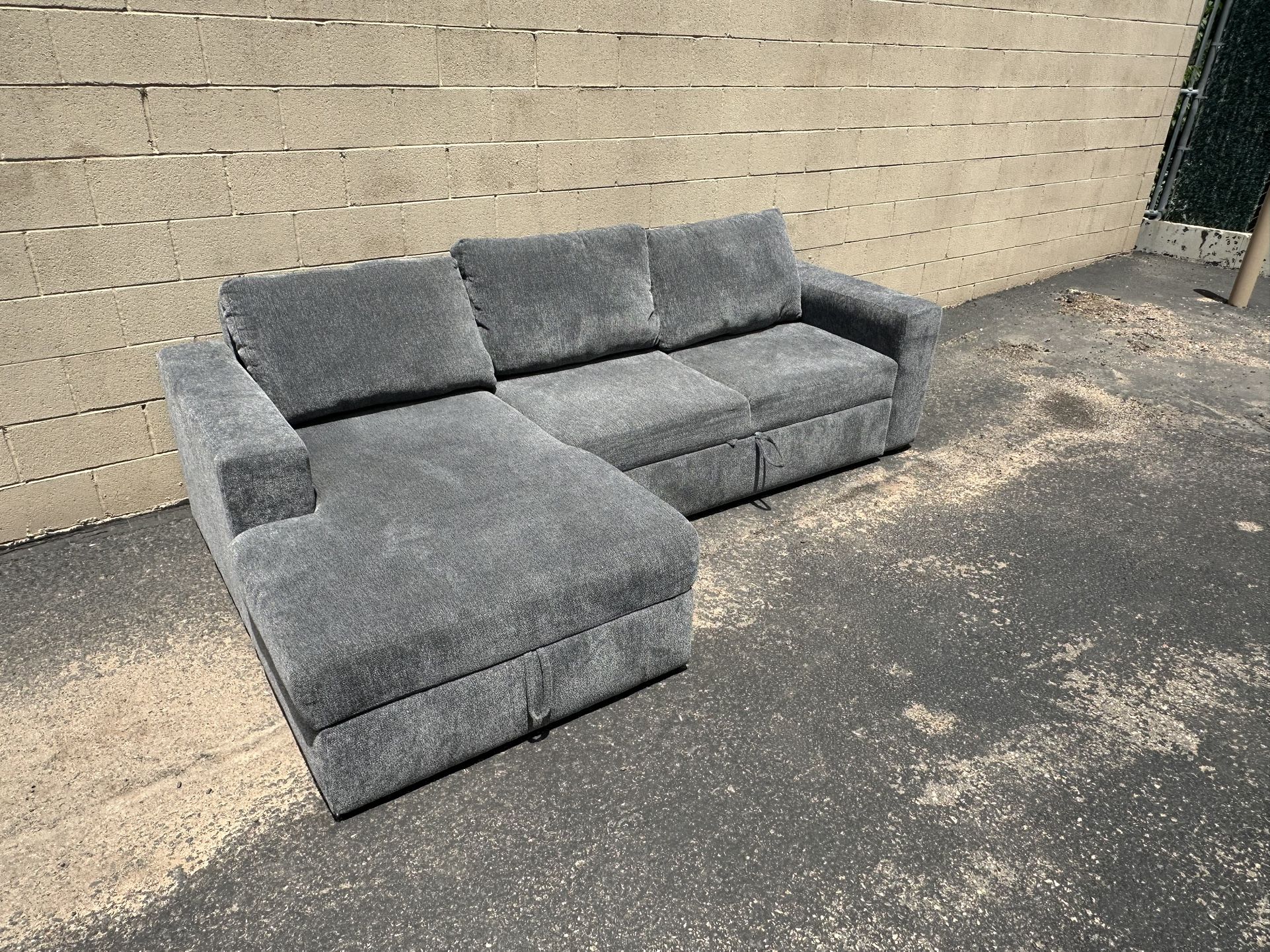Living Spaces Sebastian Sleeper 2 Piece Sectional w/ Storage Chaise – Left Arm Facing