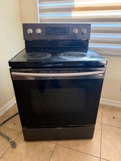 Samsung - 5.9 cu. ft. Convection Freestanding  - $100