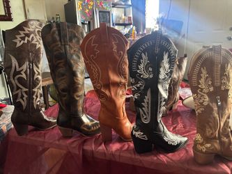 Various boots for women different styles, some knee-high some above the knee, every kind of style and many sizes