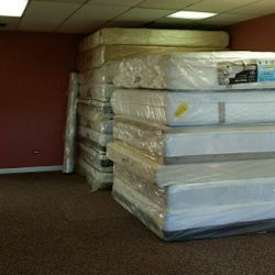 Beds,beds,beds,all sizes,the better brands,new and floor samples