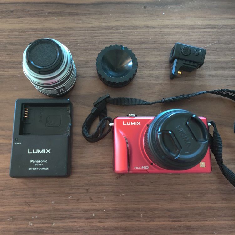 Panasonic GF2 W/ 2 Lens, Viewfinder And Battery Charger