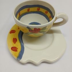 BRAND NEW CUP AND SAUCER, UNUSUAL SAUCER FRONT 