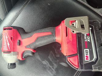 Milwaukee m18 brushless  impact with battery and charger