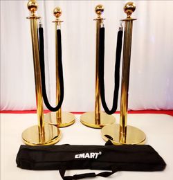 Four Gold medal Stanchions with two black ropes