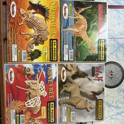 Wooden dinosaur and animal puzzle sets - 4 sets in total