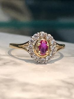 14k Yellow Gold Ruby And Cubic Zirconia Halo Ladies Ring
