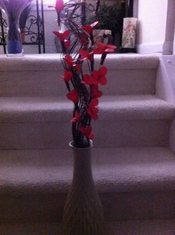 Cream vase filled with flowers