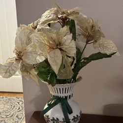 Holly Collection porcelain vase with a reticulated top, holly berry design, and a green ribbon