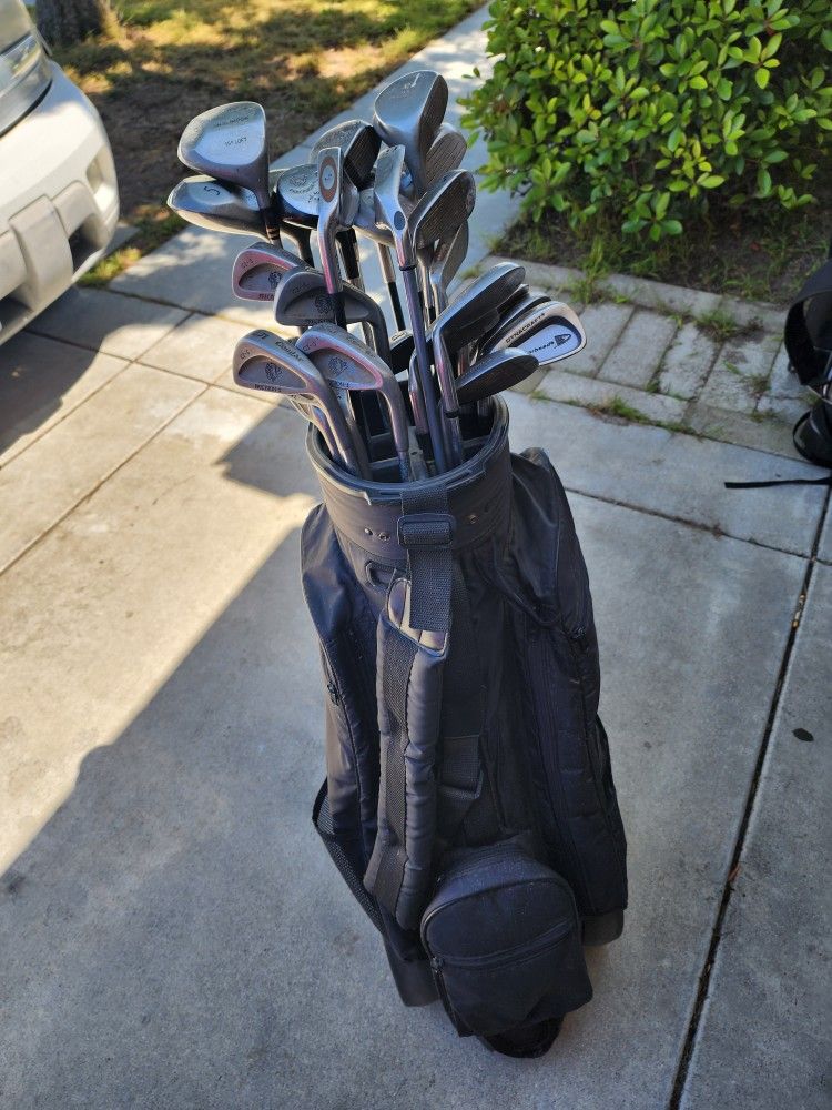 2 Sets Of Golf Clubs