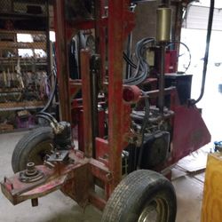 Hydromax. Post Hole  Diging Machine/forktruck