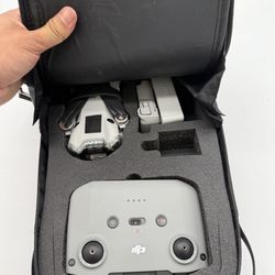DJI Mini 4 Pro Drone Bundle – 2 Batteries, ND Filters, Charging Hub, Case + Box