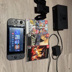 NINTENDO SWITCH + CHARGER DOCK + 3 PHYSICAL GAMES
