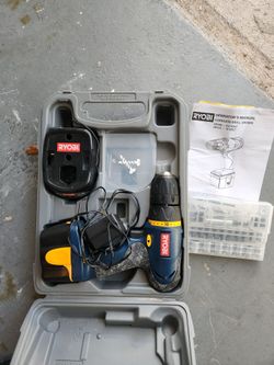 Ryobi 9.6 volt drill with case and accessories