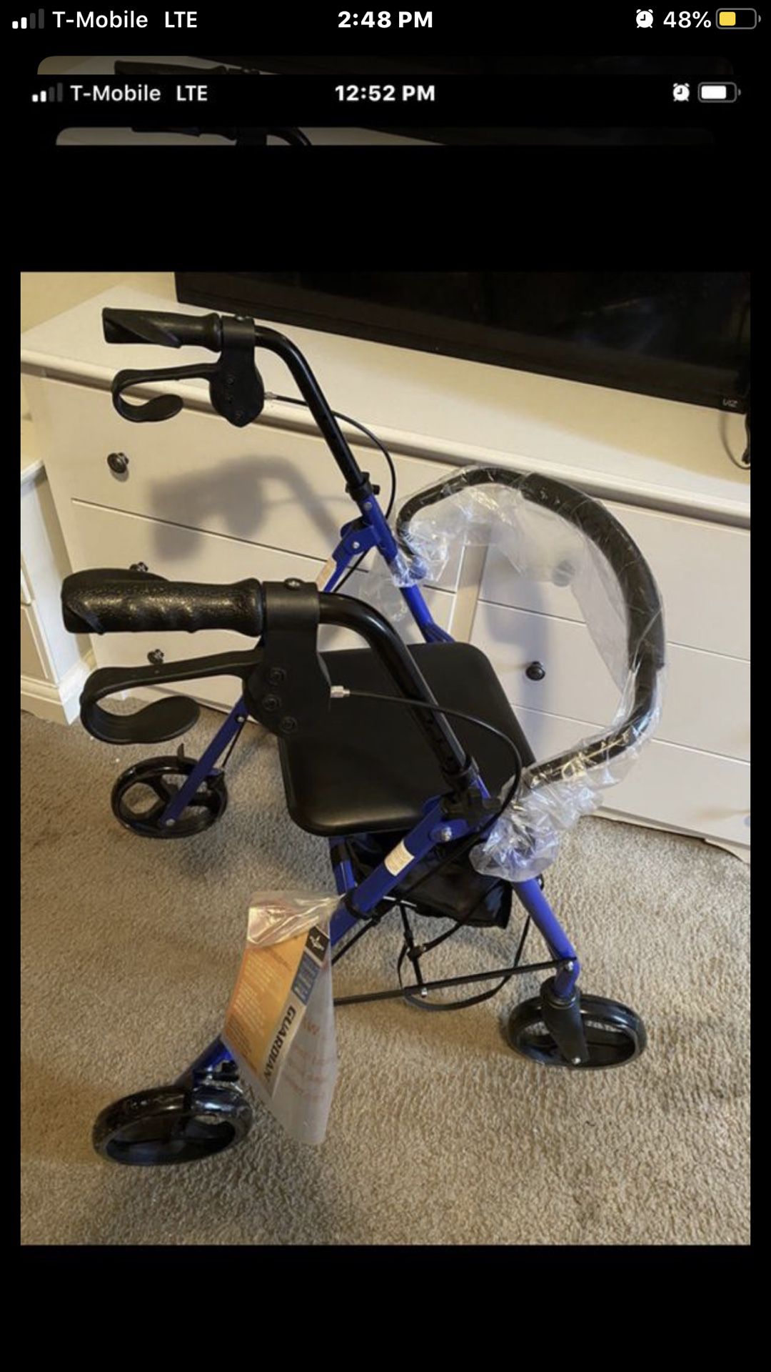New walker with wheels, storage underneath holds 300 pounds