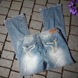 Ariya White Washed Distressed Flap Embroidered Back Pocket Flare Leg Jeans (14)