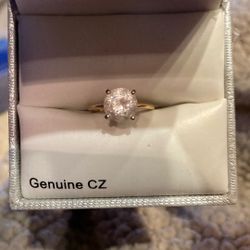 Genuine CZ in 14 karat gold setting