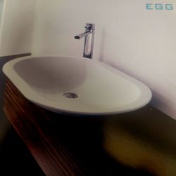 Sinks, faucets, mirrors, and tubs