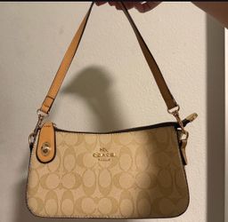 Beige coach purse