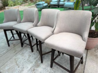 Set of 4 Upholstered Swivel Counter Height Bar Stools – $200
