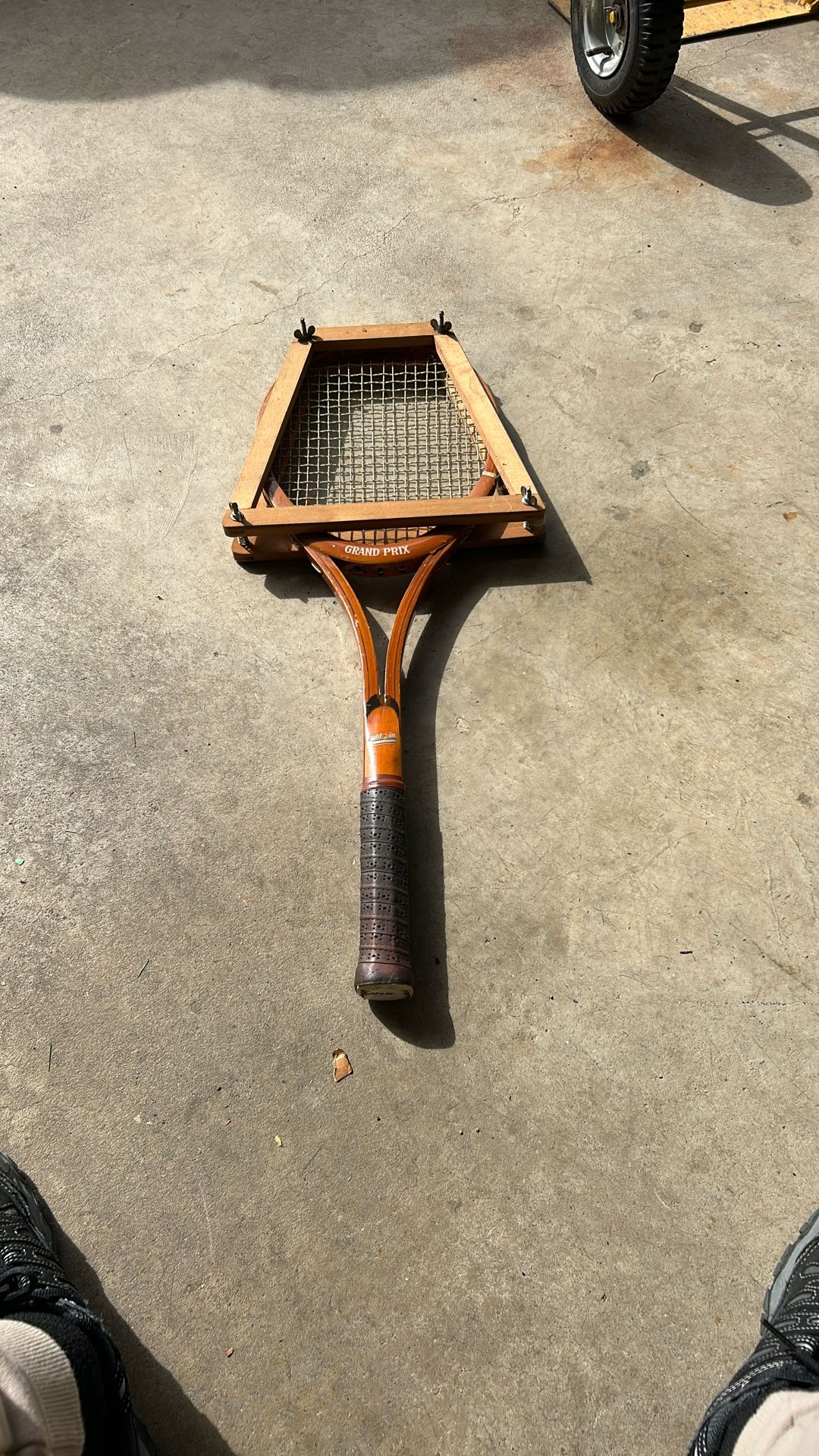 Two Tennis racket and Racket Press