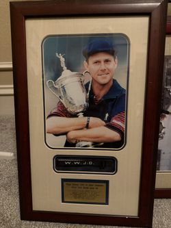 framed photograph commemorating Arnold Palmer's final British Open appearance at St. Andrews in 1995