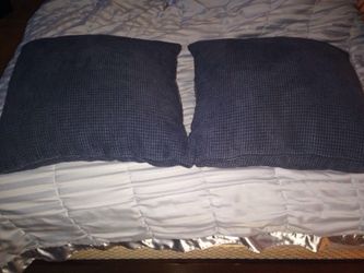 Pillows for a couch or bed in blue