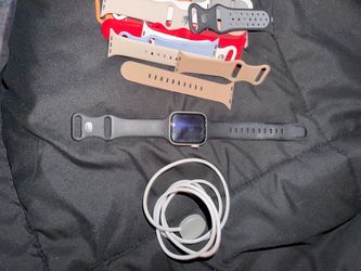 Apple Watch with Charger and Extra Bands