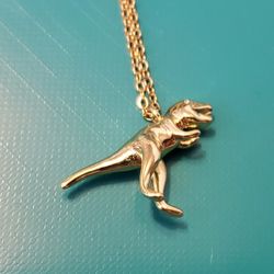 Gold Tone Metal T Rex Dinosaur Necklace 