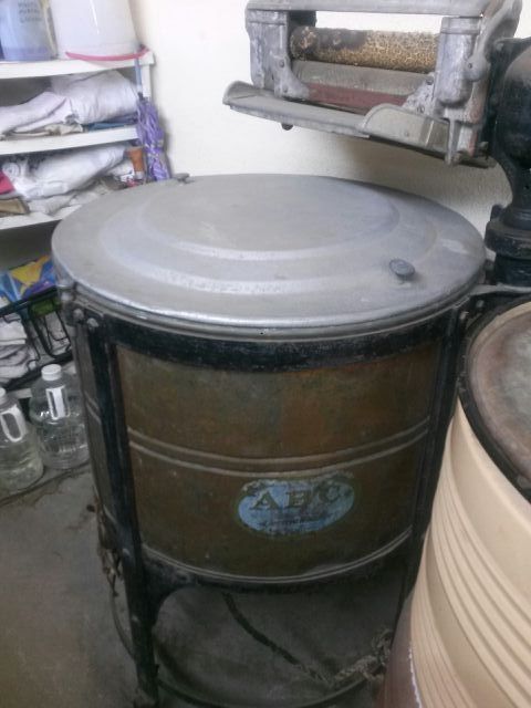 Vintage copper washing machine from the 1920s to the 1930 with decal