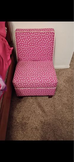 small pink childs chair