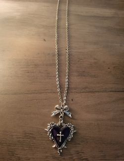 Purple and silver heart cross necklace with a touch of gothic charm