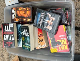 Bin with books, movies and CDs