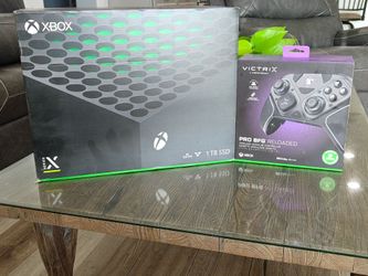 Xbox series X like new 1tb with 4 sealed games and new controller