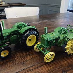 Two John Deer  Toy Tractors 