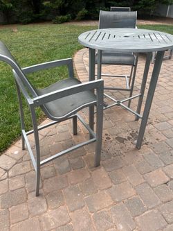 Coffee table for chairs and bar top style chair with two chairs
