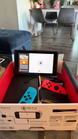 Nintendo Switch with Neon Red and Neon Blue Joy-Con
