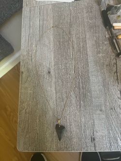 Fossilized shark tooth pendant