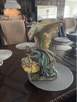 Beautiful resin figuring angel and baby Jesus