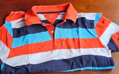 Tommy Hilfiger striped polo shirt.
