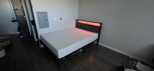 Queen memory foam mattress and LED bed frame with outlets