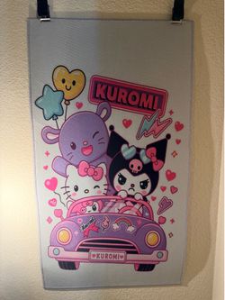 Hello Kitty and Kuromi riding in a pink convertibl