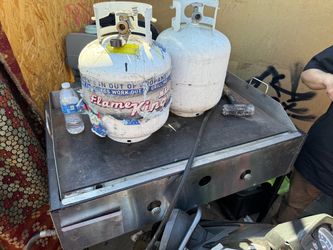 Grill and two tanks