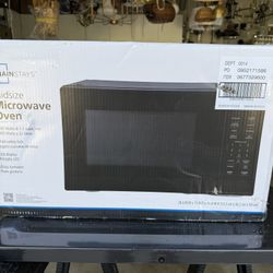 Mainstays 1.1 cu ft Microwave Oven in black 1000 Watts