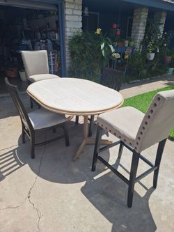 Oval table for sale with 3 chairs and 2 high chairs
