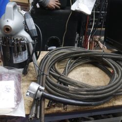 RIDGID K-50  Sectional Drain Cleaning Machine  w 10 coil sections , heads, guide tube , gloves . pre owned. ( but its look new ). 