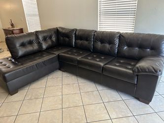 Black leather sofas