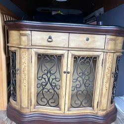 Wooden Tv stand wit metal accent and granit top by