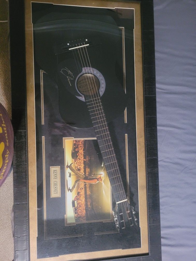 Signed guitar By Kenny Chesney