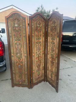 antique folding room divider / fire screen in a Victorian or Renaissance Revival style
