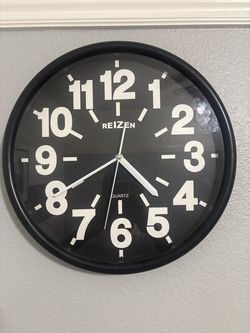 Reizen Clock